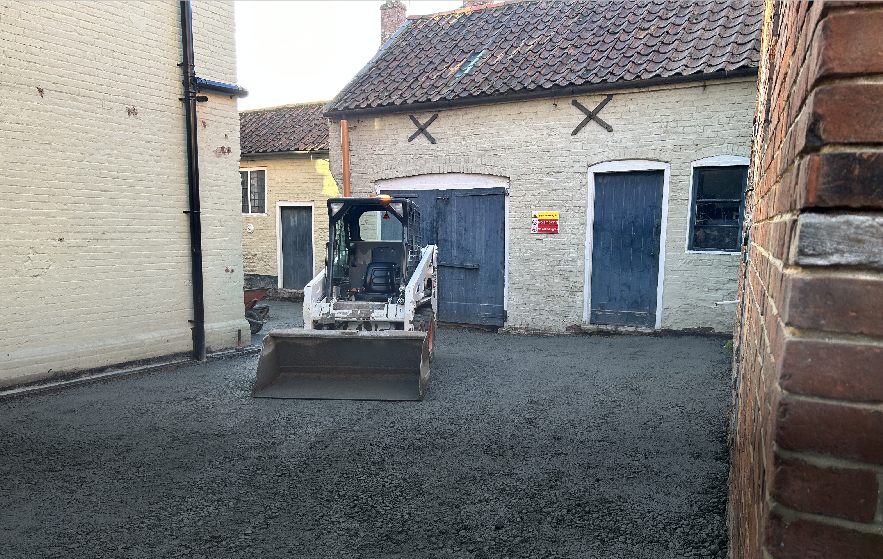 Skidsteer on site. Groundworks like Paving or drainage can be done.